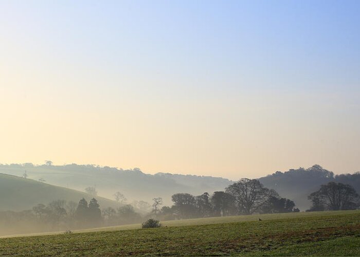 Misty Greeting Card featuring the photograph Misty dawn over the Cornish countryside by Tony Mills
