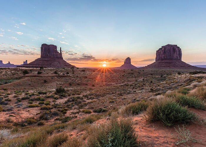 American Landscape Greeting Card featuring the photograph Monument Valley Sunrise peaking through by John McGraw