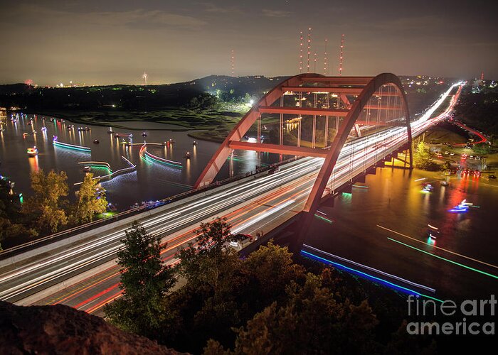 Loop 360 Boat Ramp Park Greeting Card featuring the photograph Nighttime boats cruise up and down the Loop 360 Bridge, a boater by Dan Herron