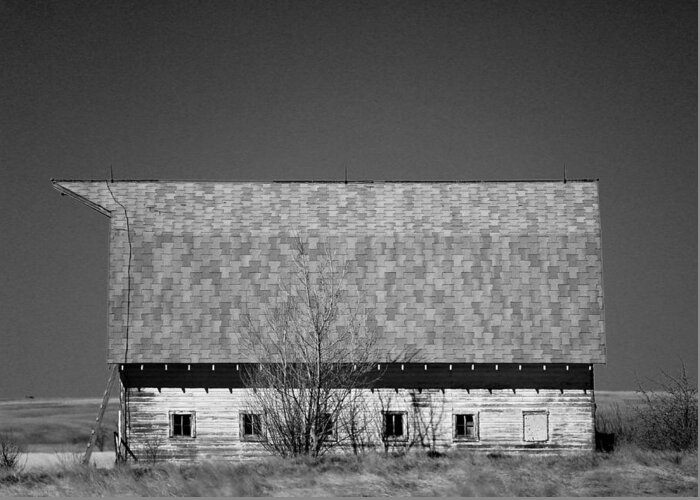 Black And White Greeting Card featuring the photograph Old barn in Heritage Montana BaW by Jeff Swan
