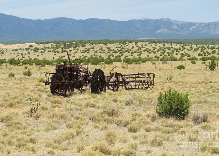 Farm Greeting Card featuring the photograph Old tractor and rake in New Mexico by Jeff Swan