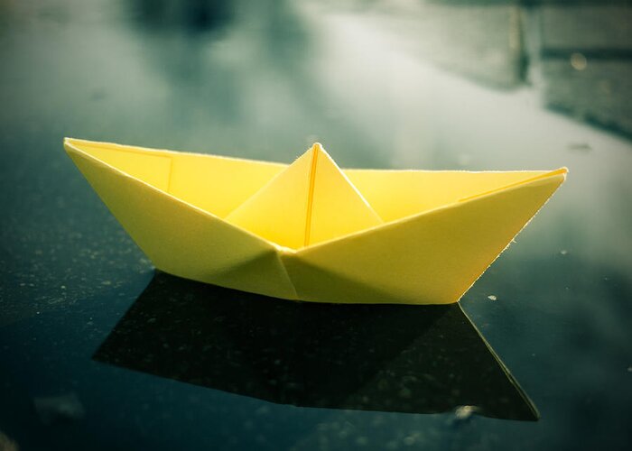 Paperboat Puddle Water Origami Greeting Card featuring the photograph Paper Boat Puddle by Janine Pauke
