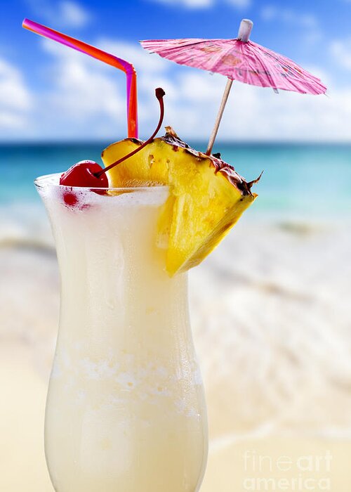 Pina Colada Greeting Card featuring the photograph Pina colada cocktail on the beach by Elena Elisseeva