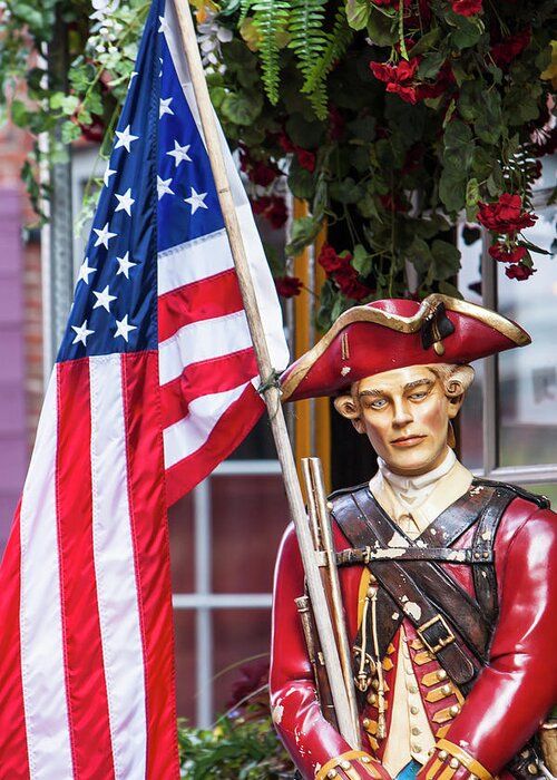 Boston Greeting Card featuring the photograph Red Coat holding the American flag by Jason Hughes
