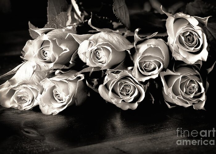 Roses Greeting Card featuring the photograph Roses on a table in black and white by Simon Bratt