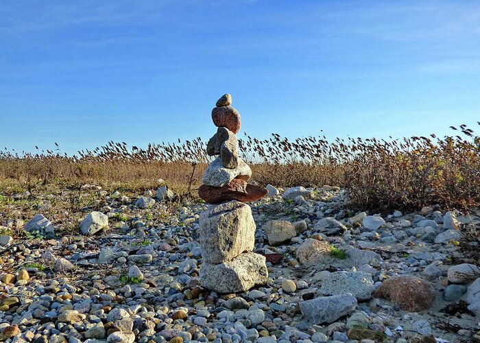 Inuksuk Greeting Card featuring the photograph Sculpture on the Beach, Symbol of Hope and Friendship by Lyuba Filatova