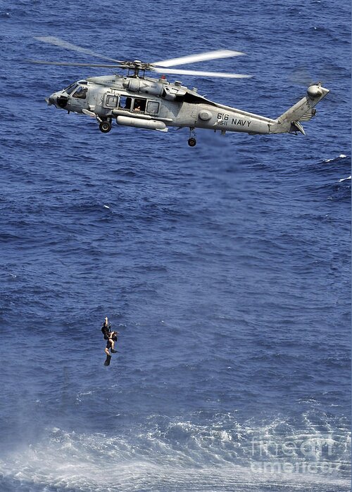 Navy Greeting Card featuring the photograph Search And Rescue Swimmers by Stocktrek Images