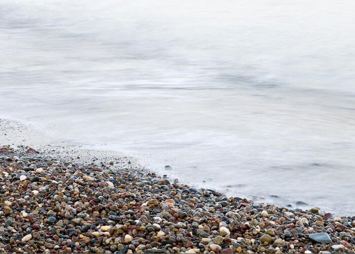 Beach Greeting Card featuring the photograph Seashore waves and stones abstract by Michalakis Ppalis