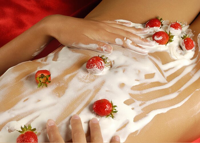 Woman Greeting Card featuring the photograph Sexy Nude Woman Body Covered with Cream and Strawberries by Maxim Images Exquisite Prints