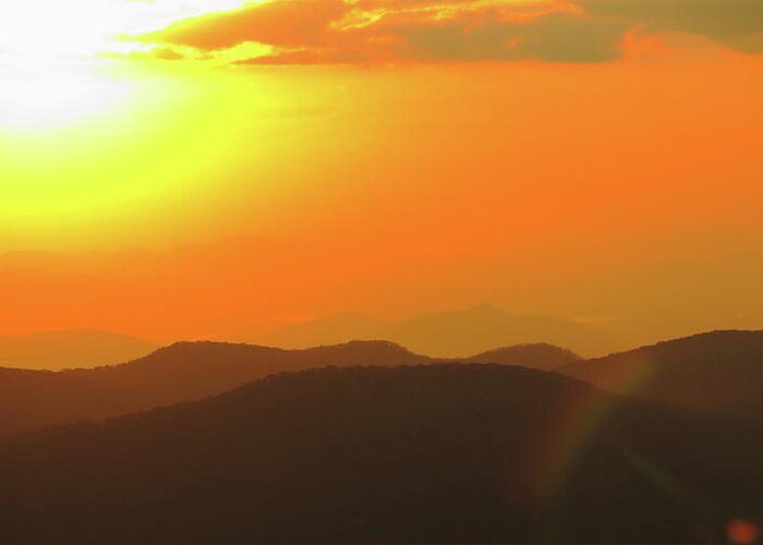 Sunset Greeting Card featuring the photograph Smoky Sunset by Daniel Reed