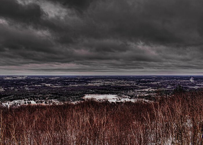 Winter Greeting Card featuring the photograph Snowstorm Clouds Over Rib Mountain State Park by Dale Kauzlaric