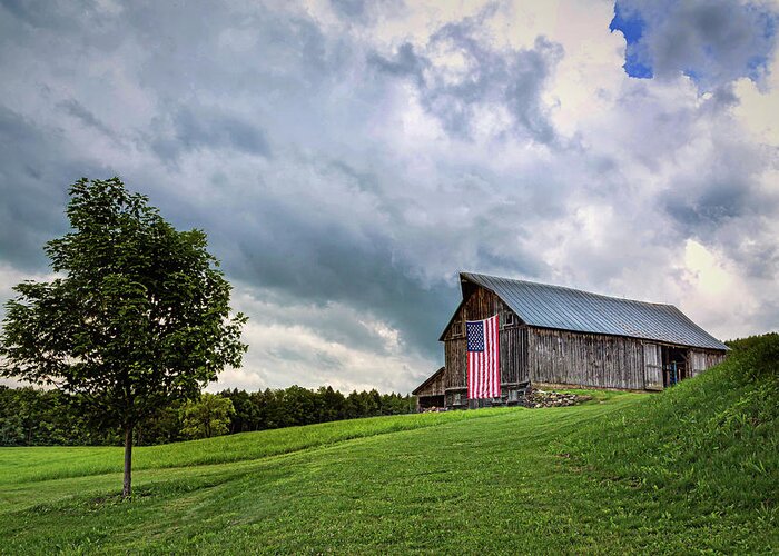 American Flag Greeting Card featuring the photograph Storm Clouds Over Old Glory by John Vose