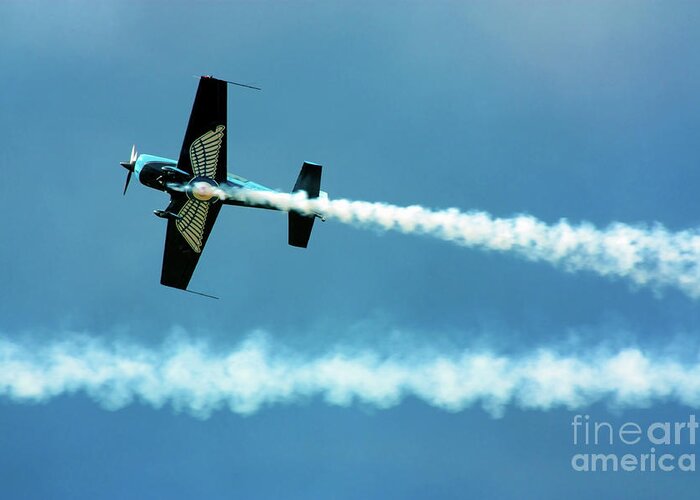 Aviation Greeting Card featuring the photograph Stunt plane with smoke trails by Simon Bratt