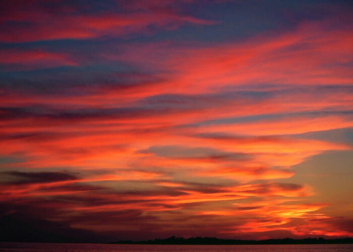 Sunset Over Water Greeting Card featuring the photograph Sunset Sky by Sally Weigand