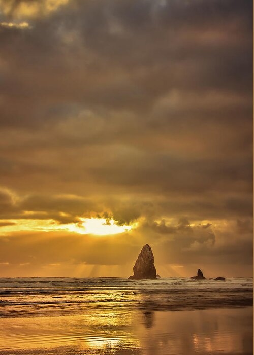 Cannon Beach Greeting Card featuring the photograph The Evening Glow by Don Schwartz