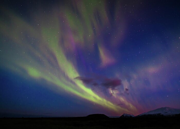 Astronomy Greeting Card featuring the photograph The Northern Lights - Iceland - Travel photography by Giuseppe Milo