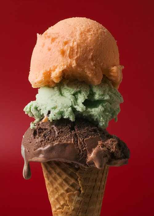 Three Greeting Card featuring the photograph Three scoop ice cream on red background by Garry Gay