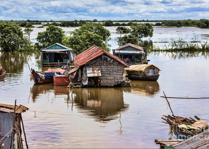 Cambodia Greeting Card featuring the photograph Tonle Sap houses by Chuck Kuhn