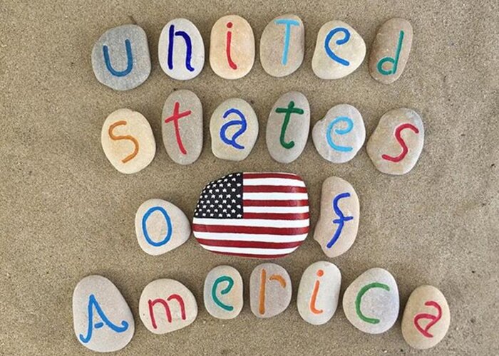 Stones Greeting Card featuring the photograph United States Of America With Usa Flag by Adriano La Naia