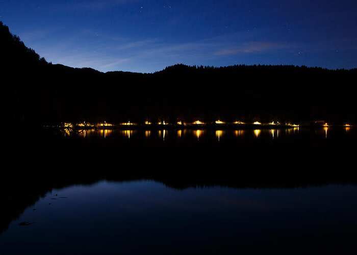 Bled Lake Greeting Card featuring the photograph View across Lake Bled at night by Ian Middleton