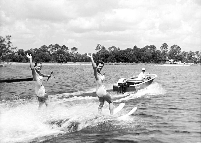 1950s Greeting Card featuring the photograph Women Water Skiers Waving by Underwood Archives
