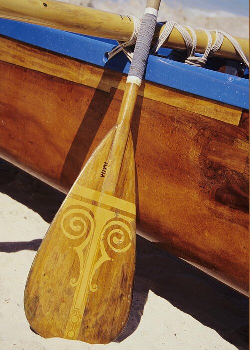 Aku Greeting Card featuring the photograph Wooden Paddle And Canoe by Joss - Printscapes