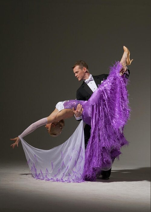 Teamwork Greeting Card featuring the photograph Ballroom Dancing Pair Performing Dip #1 by Pm Images