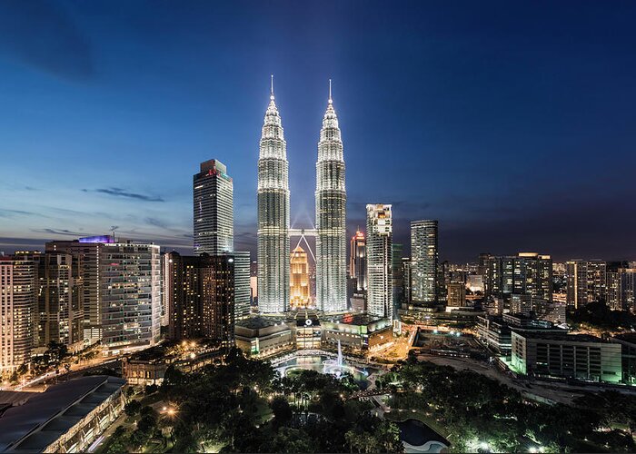 Built Structure Greeting Card featuring the photograph Elevated View Of The Petronas Towers At #1 by Martin Puddy