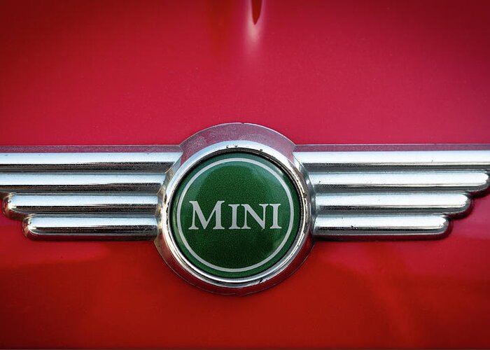 Mini Greeting Card featuring the photograph Mini Cooper car logo on red surface #2 by Michalakis Ppalis