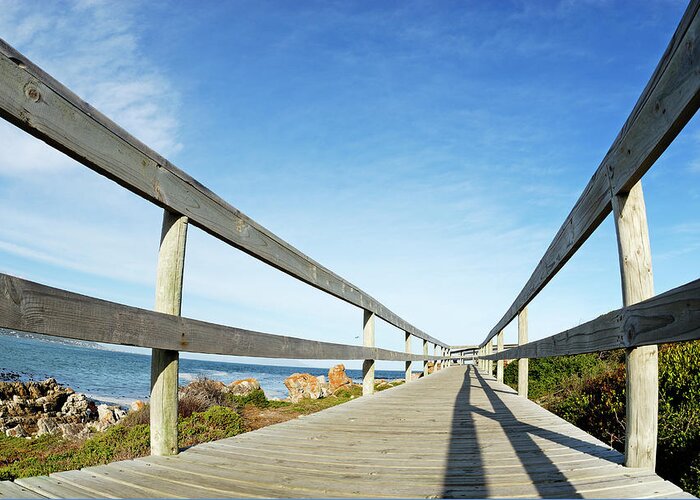 Tranquility Greeting Card featuring the photograph Wooden Footbridge By Ocean #1 by Sami Sarkis