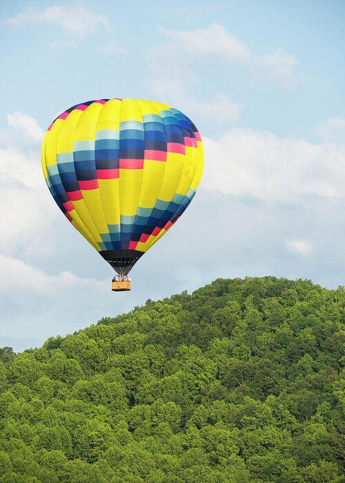 Recreational Pursuit Greeting Card featuring the photograph Hot Air Balloon In A Blue Sky #2 by Wbritten
