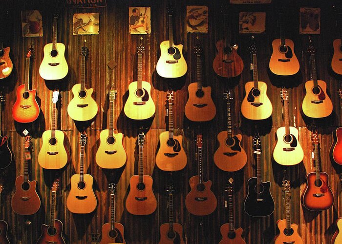 Hanging Greeting Card featuring the photograph Acoustic Guitars On A Wall by Karas Cahill Photography