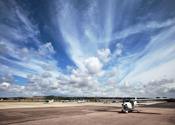 Shoreham-by-sea Greeting Card featuring the photograph Airport Cloudscape And Light Planes by Stevegeer