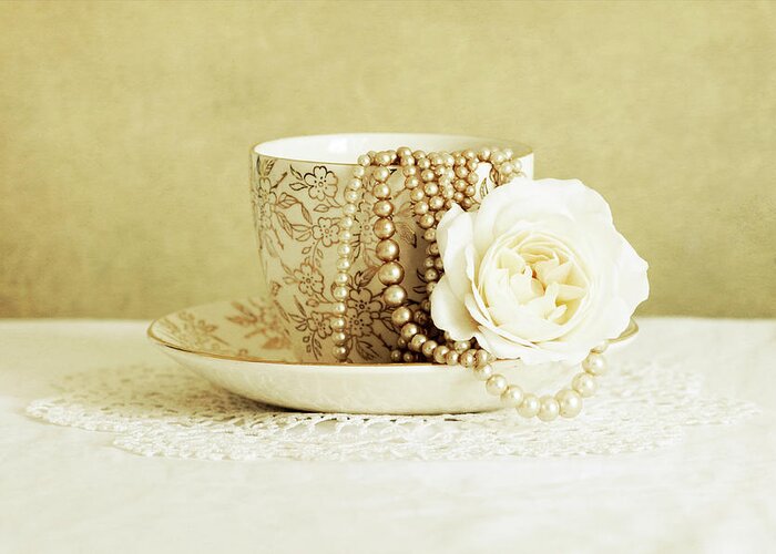 Antique Cup And Saucer With White Flower And Pearls Greeting Card featuring the photograph Antique Cup And Saucer With White Flower And Pearls by Tom Quartermaine
