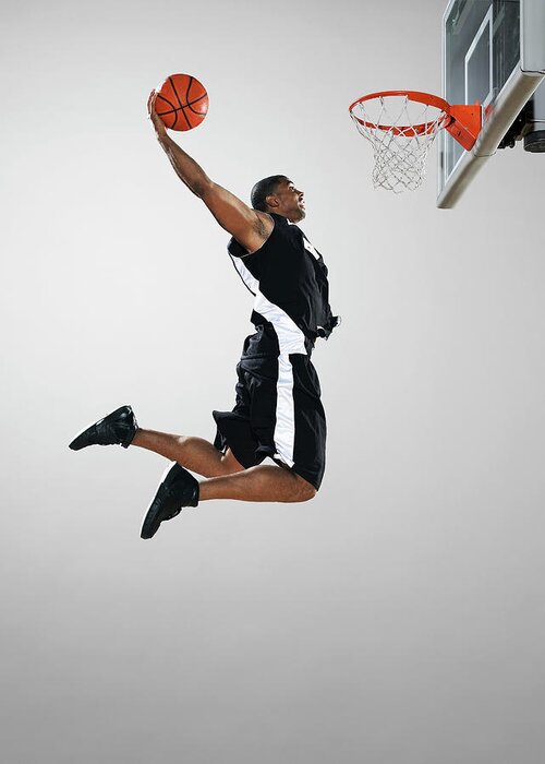 People Greeting Card featuring the photograph Basketball Player Dunking Ball, Low by Blake Little