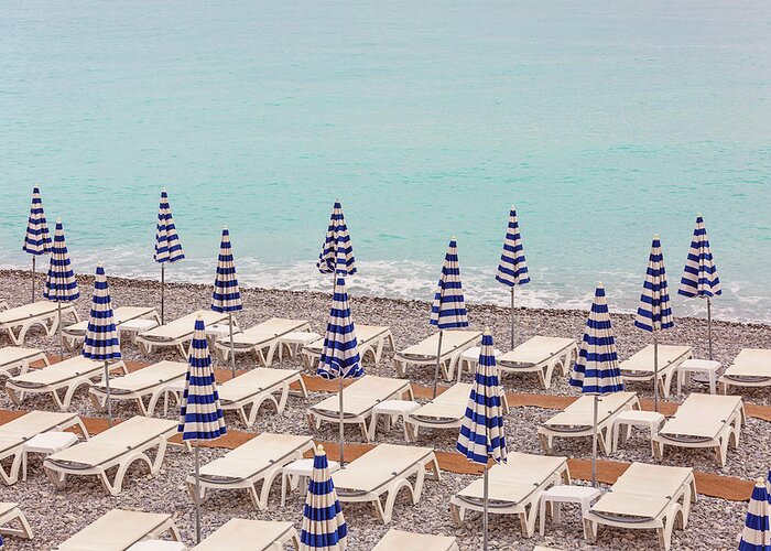 Beach Umbrellas In Nice Greeting Card featuring the photograph Beach Umbrellas in Nice by Melanie Alexandra Price