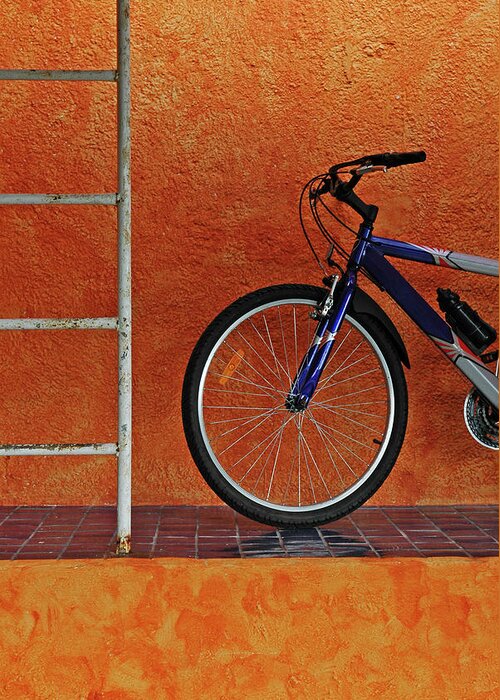 Curve Greeting Card featuring the photograph Bicycle Against Orange Wall, Vertical by Dlewis33