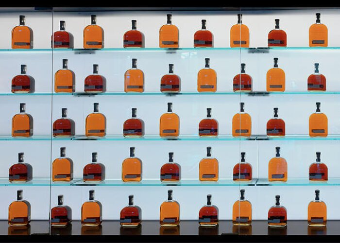 Woodford Reserve Greeting Card featuring the photograph Bourbon Bottles by Susan Rissi Tregoning