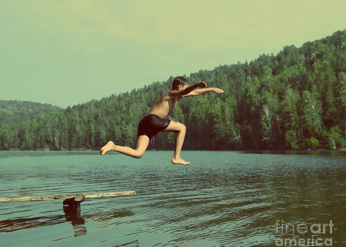 Activity Greeting Card featuring the photograph Boy Jumping In Lake At Summer Vacations by Kokhanchikov