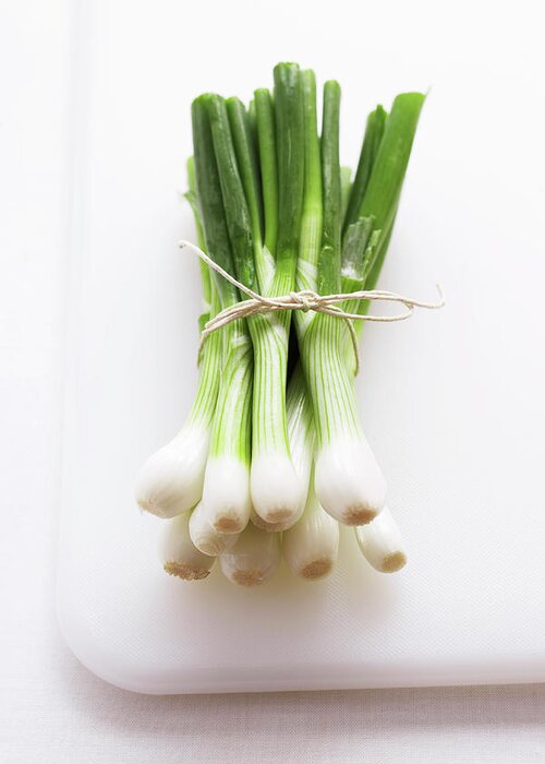 White Background Greeting Card featuring the photograph Bunch Of Spring Onions On White by Martin Poole