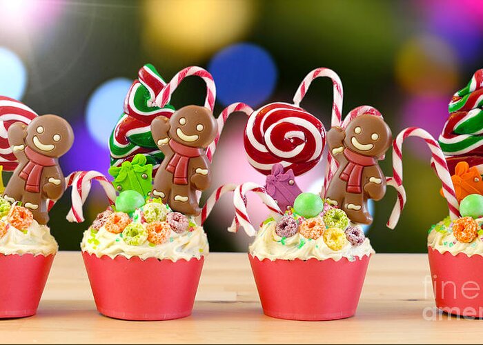 Christmas Greeting Card featuring the photograph Candyland festive Christmas cupcakes. by Milleflore Images
