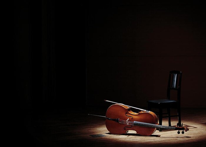 Tranquility Greeting Card featuring the photograph Cello And Chair On Stage by Sot