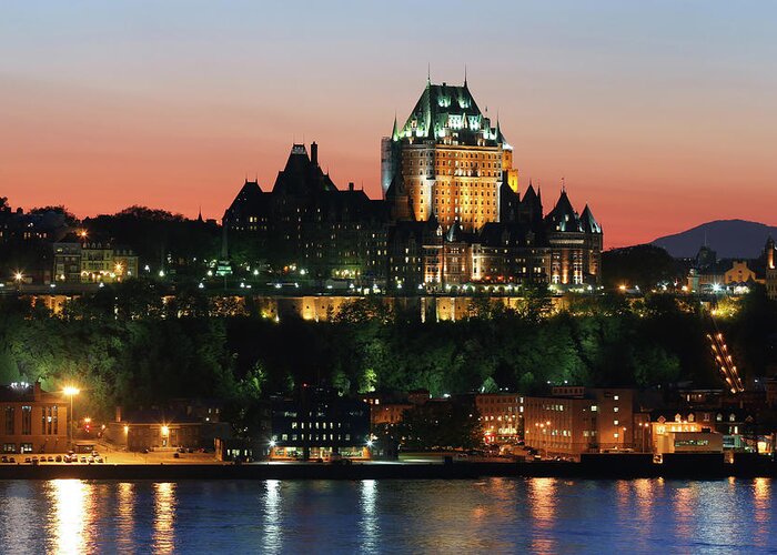 Water's Edge Greeting Card featuring the photograph Chateau Frontenac In Old Quebec City At by Buzbuzzer