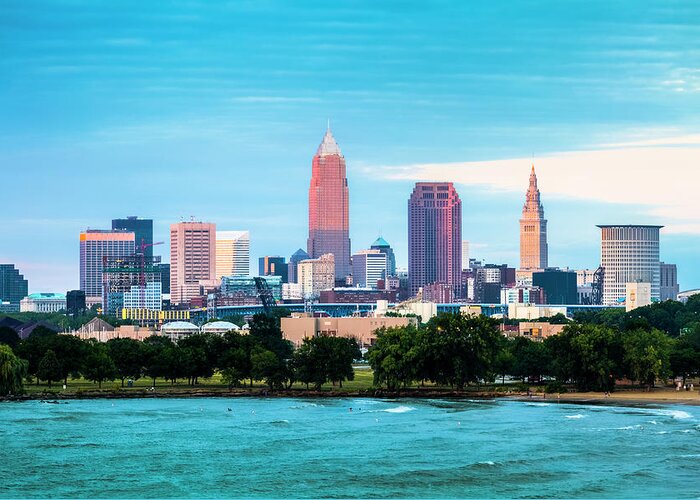 Water's Edge Greeting Card featuring the photograph Cleveland And The Lake Erie Shore At by Drnadig