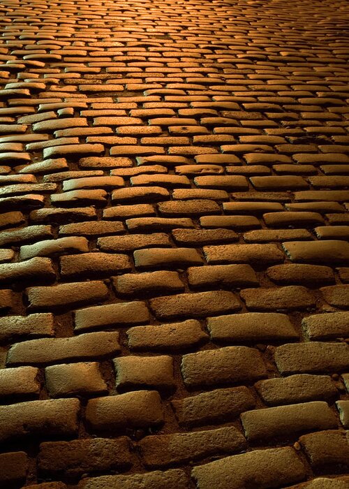 Outdoors Greeting Card featuring the photograph Close-up Of Cobblestone Street At Night by Jeff Spielman