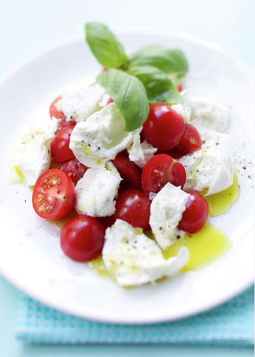 Caprese Salad Greeting Card featuring the photograph Close Up Of Plate Of Tomatoes And Cheese by Brigitte Sporrer