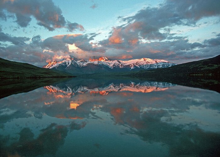 Scenics Greeting Card featuring the photograph Clouds And Mountains Reflecting In The by Mountlynx