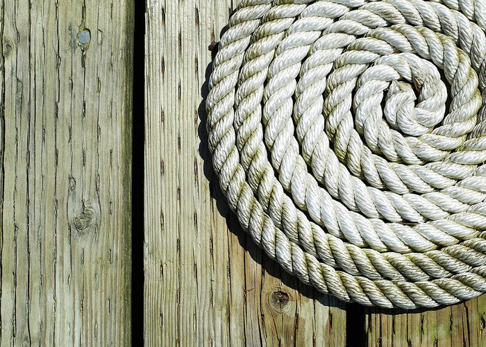 Part Of A Series Greeting Card featuring the photograph Coiled Rope On Dock by Ryan Mcvay