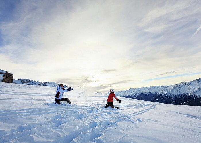 Skiing Greeting Card featuring the photograph Couple At The Top Of A Mountain by Ultramarinfoto