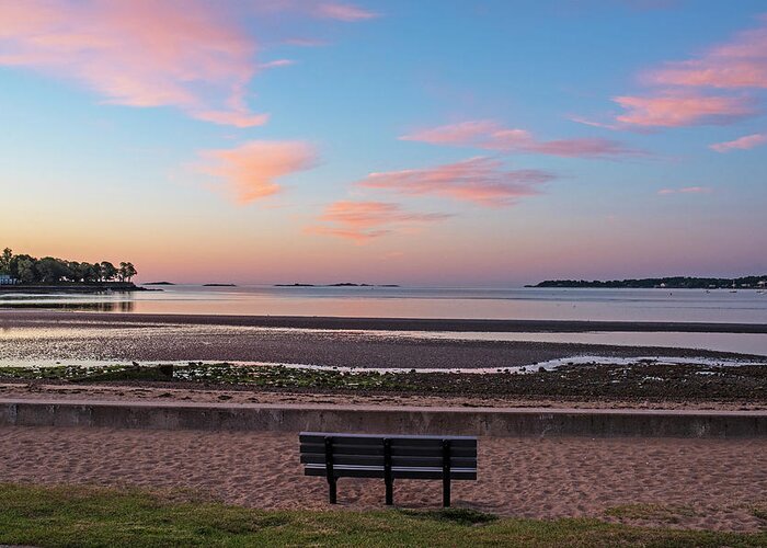 Beverly Greeting Card featuring the photograph Dane Street Beach in Beverly MA Morning Light Red Clouds Bench by Toby McGuire